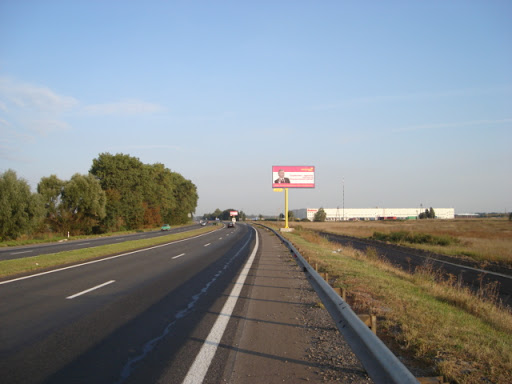 Billboard Kalynivka,  s. Kalinivka, trasa M-01 "Kiiv-Cernigiv-Novi Arilovici", km 34+550 pravo, ob'izd m. Brovari, cerez 100m pisla Baumit-Ukraina, za 250m do povorotu na st. Brovars'ka ta Raben Ukraina