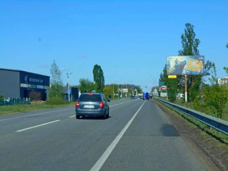 Billboard Vorzel,  m. Buca, trasa M-07 "Kiiv-Kovel'", km 31+400 pravo, cerez 450m pisla povorotu na avtoslah T1001 ta smt. Vorzel', za 550m do AZS BRSM Nafta, za 700m do ZK "Forest Lend"