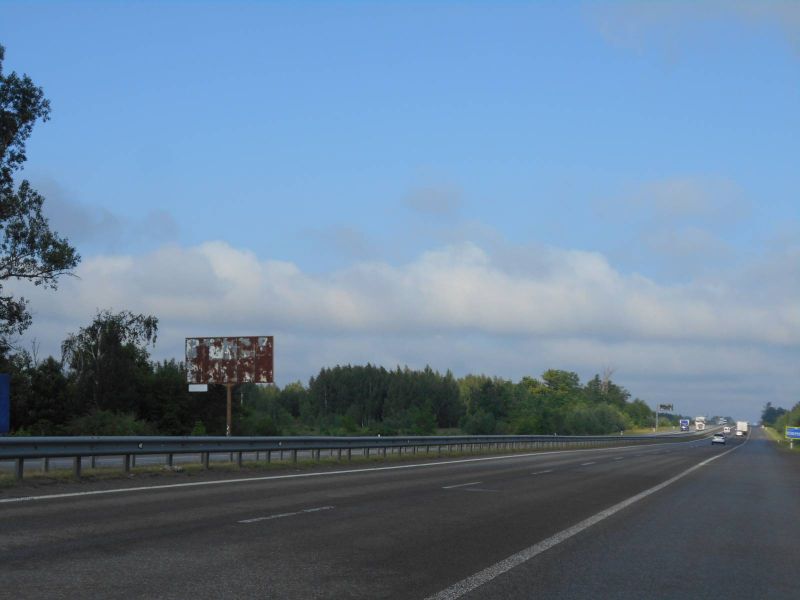 Billboard Kiev roads,  Trasa M-06 "Kiiv-Cop" (Zitomir), km 41+370 livo, povorot na kotedzne mistecko "Nimec'ka sloboda"