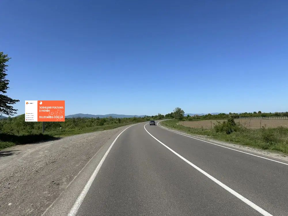 Billboard Tyachiv,  Trasa Mukacevo-Rogatin, miz m. Taciv ta smt. Bustino, v storonu m. Uzgorod