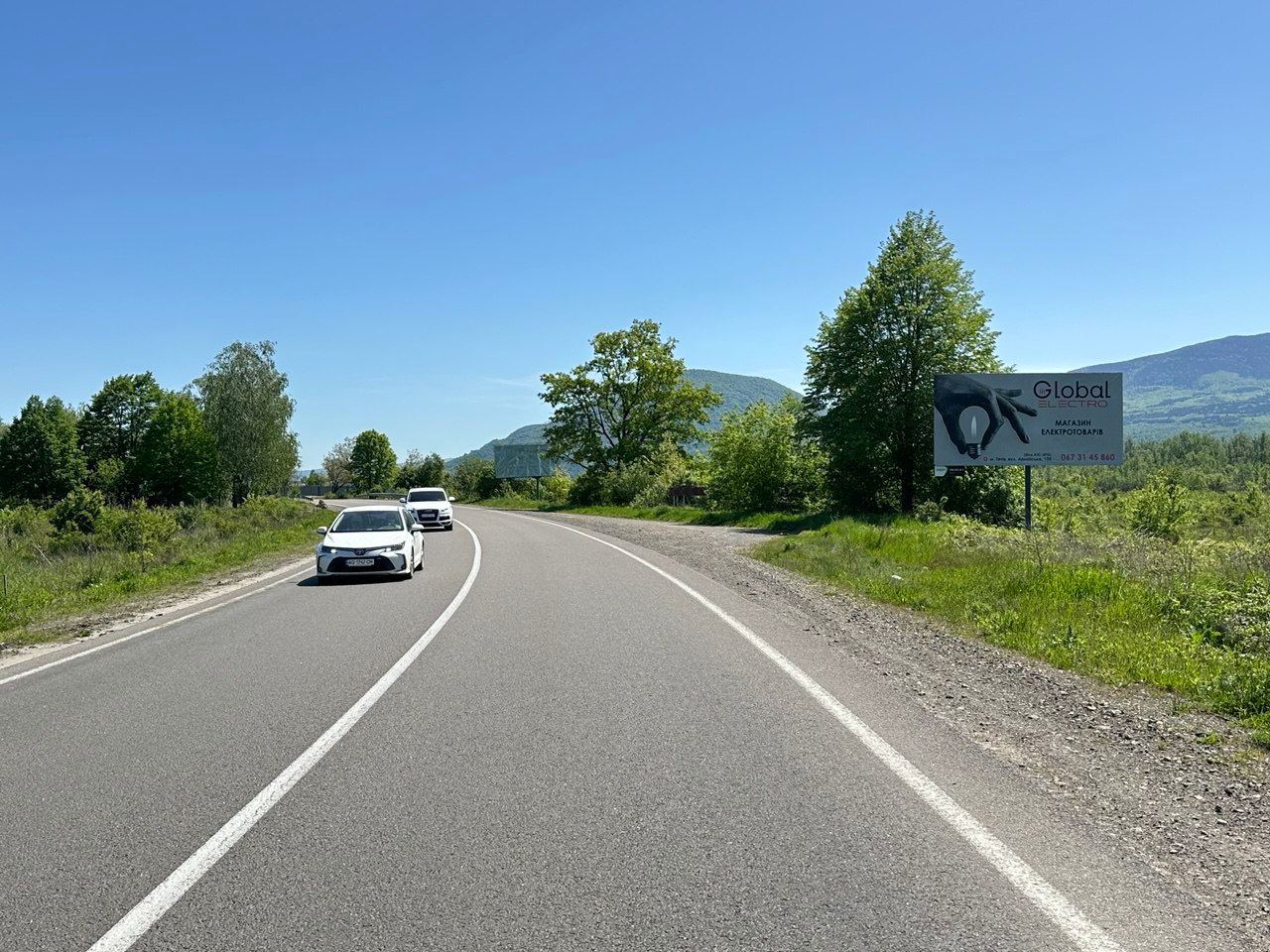 Billboard Tyachiv,  Trasa Mukacevo-Rogatin miz smt. Bustino ta m. Taciv, v storonu m. Rahiv