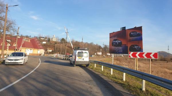 Билборд Хуст,  м.Хуст, вул. Волошина, (переїзд)  в'їзд в місто траса Мукачево-Івано-Франківськ, в сторону м. Тячів