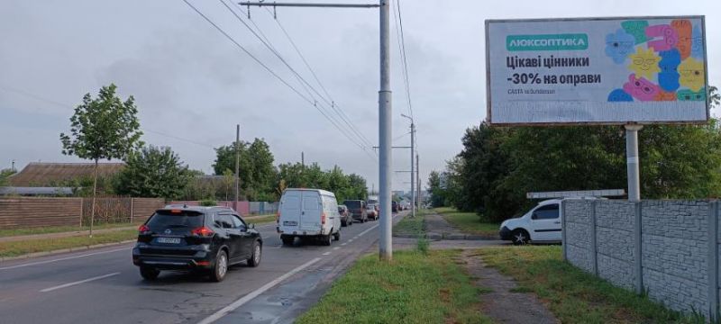Билборд Белая Церковь,  Вул. Дружби біля стоянки (в центр)