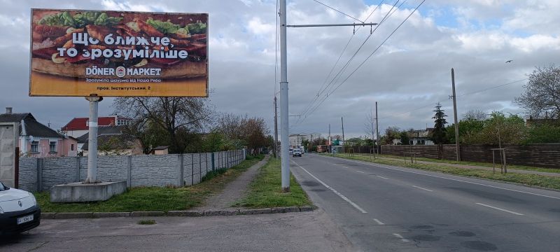Билборд Белая Церковь,  Вул. Дружби біля стоянки (з центру)