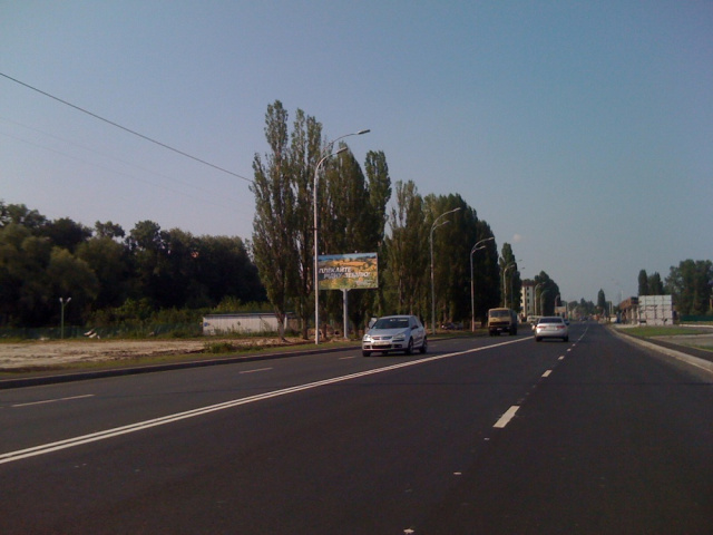 Billboard Vishgorod,  Naberezna, drugij vid povorotu na prospekt Sevcenka, 150m do zupinki "Kinoteatr MIR" naav. u Kiiv