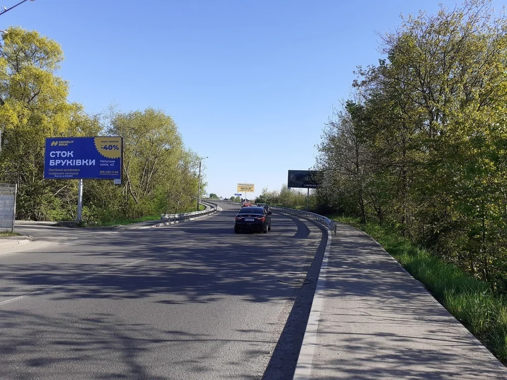 Білборд, бігборд (борд)  Івано-Франківськ,  Коновальця виїзд з міста до Буковелю, Чернівців, Яремчі, Надвірної. поруч МРЕВ
