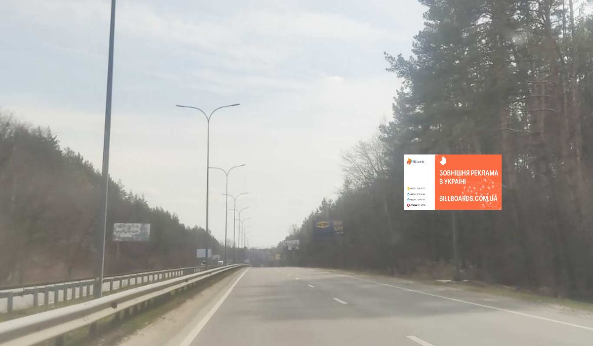 Billboard Vishgorod,  1350 m. pisla povorotu z avtomobil'nou dorogi R-02 "Kiiv-Ivankiv-Ovruc" na avtomobil'nu dorogu R-69 "Kiiv-Visgorod-Desna-Cernigiv",u napramku st. Bogatirs'kij., m. Kiiv, pravoruc