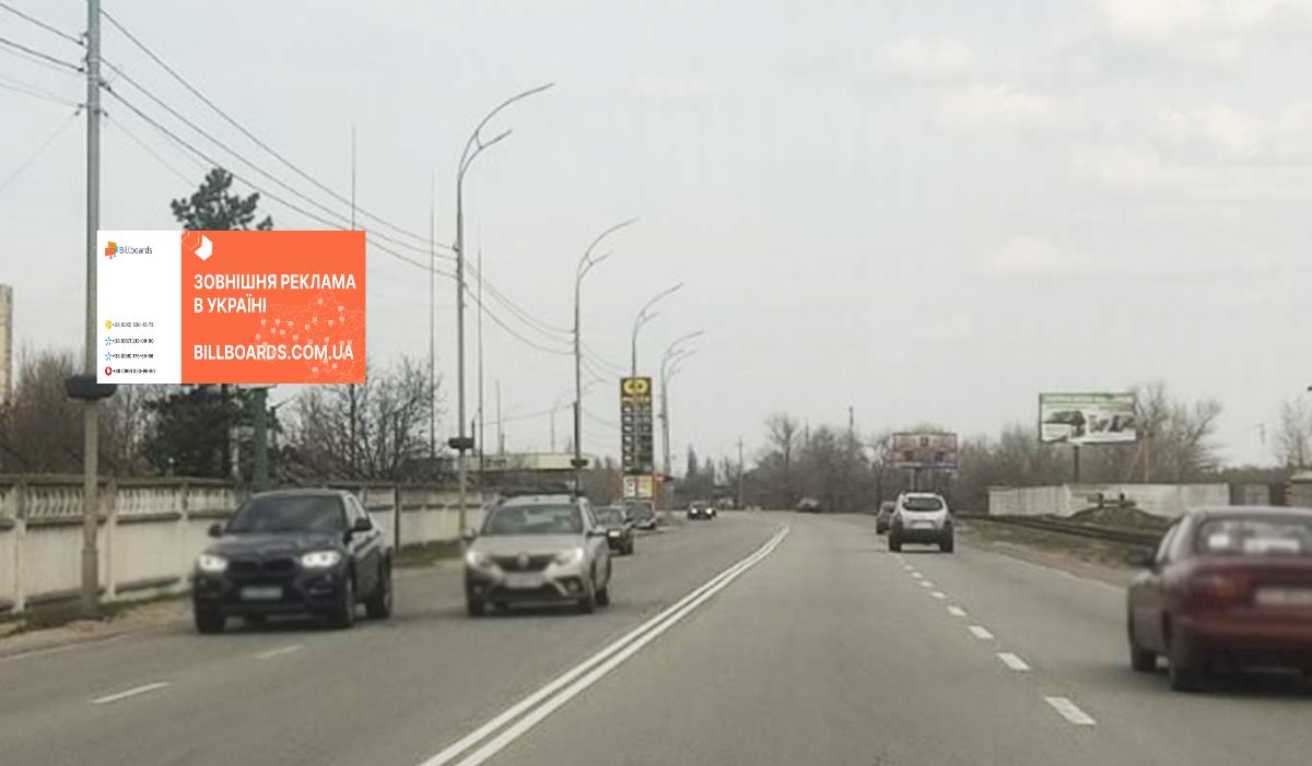 Billboard Vishgorod,  st. Naberezna, 50 m. pisla zapravki "BRSM Nafta" (Motto), pravoruc, napramok z m. Visgoroda do m. Kiiv