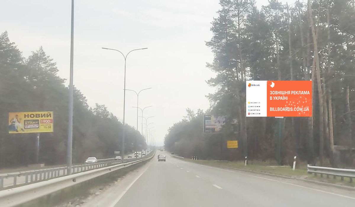 Billboard Vishgorod,  550 m. pisla povorotu z avtomobil'nou dorogi R-02 "Kiiv-Ivankiv-Ovruc" na avtomobil'nu dorogu R-69 "Kiiv-Visgorod-Desna-Cernigiv", u napramku st. Bogatirs'kij, m. Kiiv, pravoruc