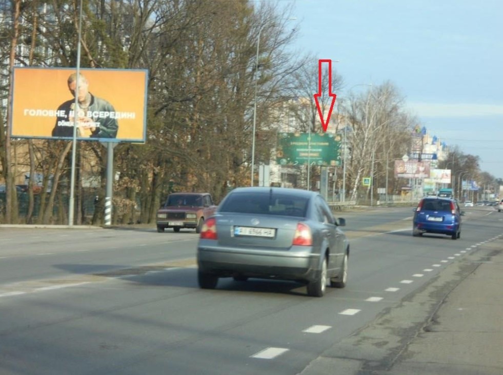 Білборд, бігборд (борд)  Буча,  вул. Нове шосе, 48 на світлофорі біля ТЦ Епіцентр