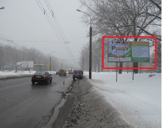 Billboard Ternopil,  Zabaraz'ke sose, bila AZS "OKKO"