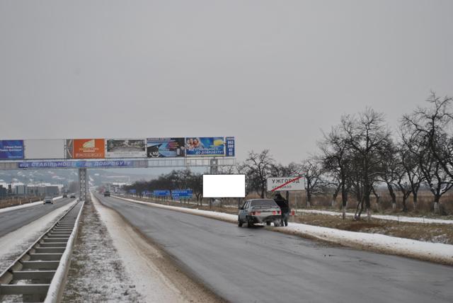 Билборд Ужгород,  Автодорога "Київ-Чоп", 200 м від кругу (перед с. Дравці)