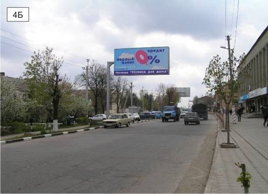 Билборд Подольск (Котовск (Подольск)),  вул. Соборна  перпендикулярно напрямку руху навпроти будівлі "Укртелеком"