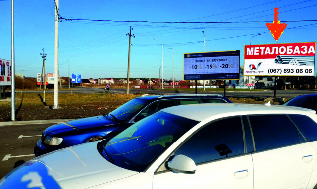 Billboard Zhovkva,  m. Zovkva, st. L'vivs'ka, 28, teritoria avtoparkovki ATB, prama vidimist' pri vihodi z dverej supermarketu, 24/7 velikij tranzit, miscevi ziteli + aglomeracia