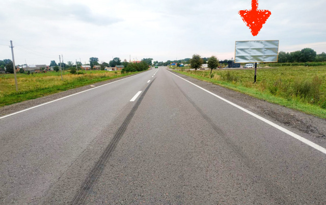 Billboard Zhovtansi,  smt. Zovtanci, vizd v Zovtanci z napramku m. L'vova, na m. Kam'anka - Buz'ka, trasa L'viv-Luc'k (N-17)
