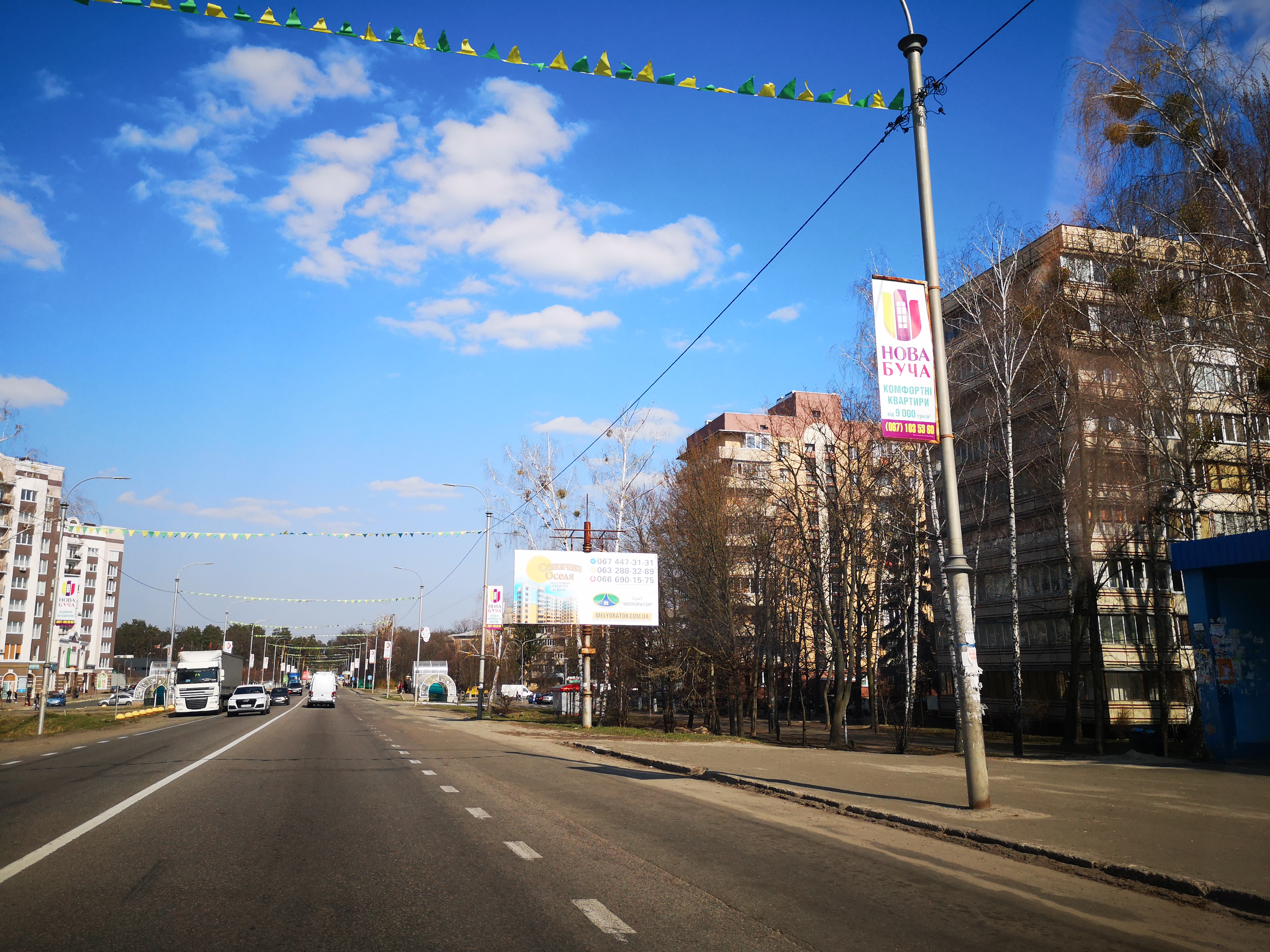 Billboard Bucha,  trasa Kiiv-Kovel', st. Nove-sose,  bila stadionu