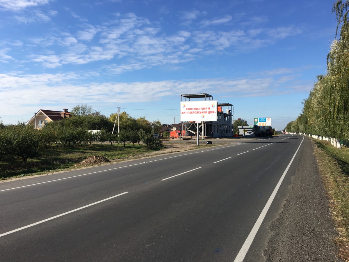 Билборд Новоселки,  вул. Новосілківська, перед поворотом на масив Яблуневий,  ЖК "Виноградна долина", узбіччя дороги Новосілки-Чабани, ліворуч