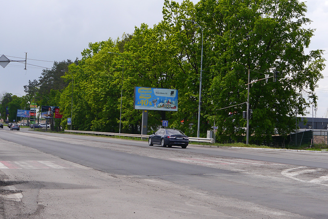 Билборд Буча,  м. Буча, вул. Нове шосе, 48 на світлофорі біля ТЦ "Епіцентр"