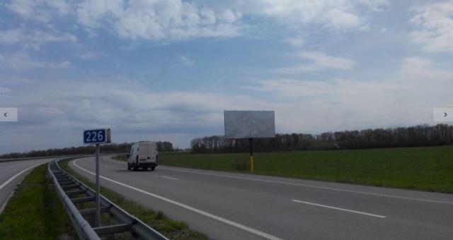 Billboard Zvyagel,  Ob"izdna Novograda. Bila Cersanit No 2. Livoruc. Napramok z Rivnogo na Zitomir