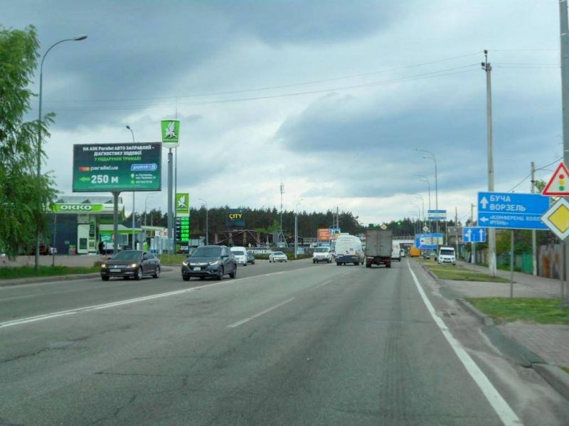Billboard Gostomel,  м. Гостомель-м. Ірпінь, вул. Шевченка-вул. Свято- Покровська (навпроти №10), перетин з вул. Гайдамацька, траса М-07, км 23+550 ліво, біля АЗК ОККО, Сіті Маркет