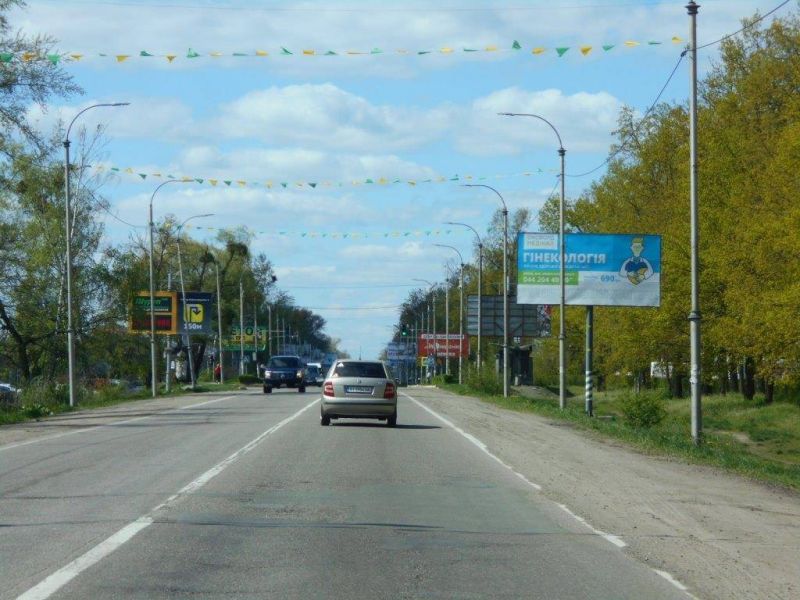Billboard Bucha,  m. Buca, trasa M-07 "Kiiv-Kovel'", km 29+000 pravo, st. Nove Sose, 16, v napramku do TC Modul', Nova Linia