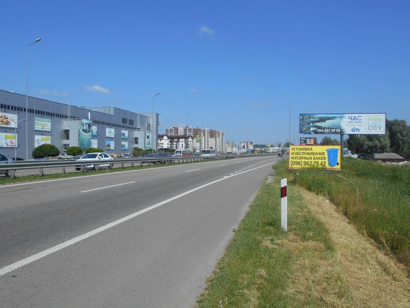 Billboard Khodosivka,  Dniprovs'ke sose, trasa N-01 "Kiiv-Znam'anka", km 23+850 livo, za 200m do povorotu na s. Hodosivku ta AZS UPG, navproti TC "MegaMarket"