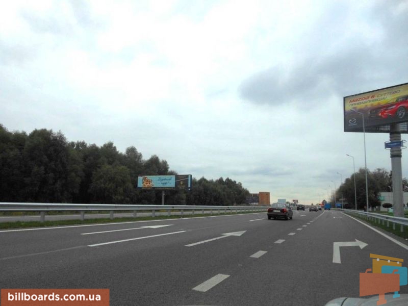 Billboard Khodosivka,  Dniprovs'ke sose, trasa N-01 "Kiiv-Znam'anka", km 23+950 livo, cerez 300m pisla povorotu na s. Hodosivku ta AZS UPG, navproti TC "MegaMarket", pravij