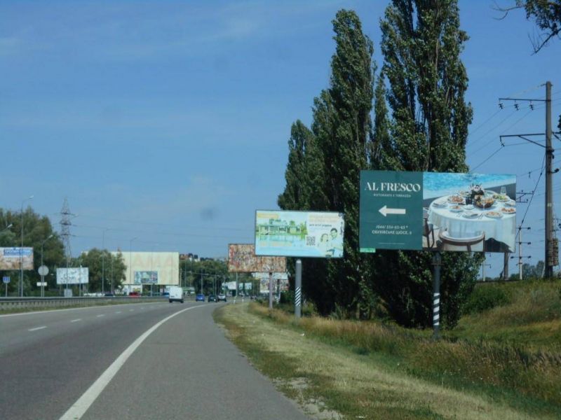 Billboard Khodosivka,  Dniprovs'ke sose, trasa N-01 "Kiiv-Znam'anka", km 23+100 livo, cerez 460m pisla povorotu na Hodosivku ta AZS UPG, sadovij centr "Interflora", Mega Market, za 270m do "Zelenij rinok", za 600m do AZS OKKO