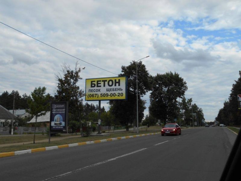 Билборд Гостомель,  м. Гостомель, вул. Свято-Покровська, 64Б, через 200м після автобусної зупинки, навпроти парку "Щасливий"