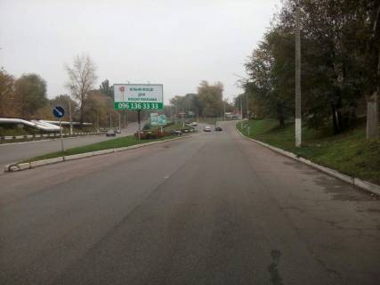 Билборд A в Каменское (Днепродзержинск) дз35А1,авторозв'язка просп. Гімназичний (Пеліна) - вул. Архітектурна (кол. Йосипа Манаєнкова, Комунарна) - вул. Васильєвська (кол. Арсенічева) (на роздільній смузі), напрямок до центру фото 1