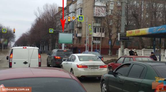 Скроллер A в Днепр (Днепропетровск) t129A3,просп. Олександра Поля (Кірова), 127 - вул. Лікаря Ребініна (Гавриленка), рух вниз, на світлофорі - 230053 фото 1