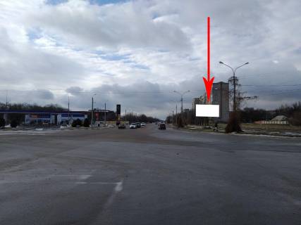 Билборд A в Никополе Нп14А,вул.Першотравнева - вул.Патріотів України, навпроти АЗС, перехрестя у напрямку цетральної частини міста, першотравневого ринку фото 1