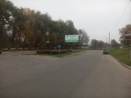 Білборд, Бігборд (Борд)  A у Кам'янське (Дніпродзержинськ) дз36А2,авторозв'язка просп. Гімназичний (Пеліна) - вул. Архітектурна (кол. Йосипа Манаєнкова, Комунарна) - вул. Васильєвська (кол. Арсенічева) (на роздільній смузі), напрямок до центру Фото 1