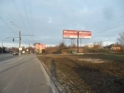 Білборд, Бігборд (Борд)  A у Кривому Розі, Ріг  вул. Вільної Ічкерії (Волгоградська),,шахта артем 1, рух у напрямку Володимира Великого пл. (кол. Артема), площина ліворуч Фото 1