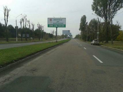 Білборд A у Кам'янське (Дніпродзержинськ) дз43А1,Єлізаветівська траса (на розділовій смузі в районі мостового перехіду), напрямок до виїзду на новий міст Фото 1