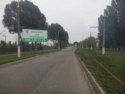 Білборд, Бігборд (Борд)  A у Кам'янське (Дніпродзержинськ) дз32А1,вул.Січеславський шлях (вул.Дніпропетровська) (р-н з/д моста ВАТ "Баглійкокс") - на розділовій смузі, напрямок до виїзду з міста Фото 1