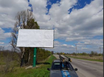 Билборд A в Каменское (Днепродзержинск) Въезд в Каменское со стороны с. Елизаветовка (справа на обочине) фото 1