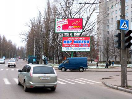 Billboard A in Kremenchuk, 3 х 6  prosp. L.Ukrainki, perehr. z st. Karnauhova, navproti  supermarketu  <<MarketOpt>> Photo 1