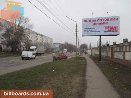 Білборд A у Кременчуці вул. Вадима Пугачова (кол. Московська), перекрёсток с Лебедина вул. (колиш. Кірова вул.), район Оптового продуктового рынка, поворот к Строительному рынку Фото 1