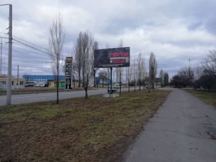 Billboard A in Kremenchuk, 3 х 6  prosp. L.Ukrainki, bila bud. 22-a, r-n <<PromFinBanka>>, avtosalonu <<Ford>>, <<Nissan>>, navproti TRC Photo 1