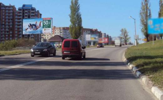 Білборд, Бігборд (Борд)  B у Обухові вул.Київська 10 (В) / ринок "Піщаний" в'їзд Фото 1
