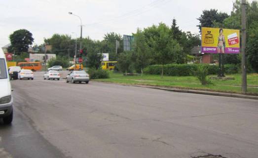 Білборд, Бігборд (Борд)  A у Рівному вул.Шухевича / вул.Князя Володимира (А) - розмір щита: 3 х 5,95 Фото 1