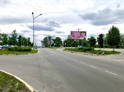 Білборд, Бігборд (Борд)  A у Бучі вул. Депутатська, виїзд на трасу Київ-Ковель, навпроти Варшавского ринку Фото 1