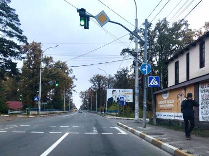 Білборд, Бігборд (Борд)  A у Ірпені вул. Університетська, біля школи №17 (в напрямку з Києва) Фото 1