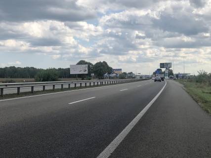 Билборд B в Буче траса Київ-Знам'янка, км 24+350 (ліворуч), 6км 350м від КПП Києва, біля ТЦ «Аракс», в напрямку з Києва фото 1