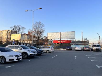 Билборд A в Ирпене, 6*3  вул. Центральна, на стоянці супермаркету «Новус» фото 1