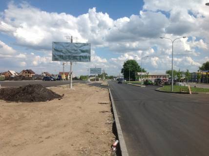 Билборд B в Буче, 6*3  вул. Депутатська, заїзд з траси Київ-Ковель, навпроти Варшавского ринку фото 1
