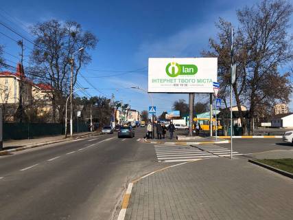 Білборд, Бігборд (Борд)  A у Ірпені, 6*3  вул. Центральна, біля стоянки супермаркету «Новус» Фото 1