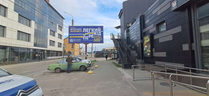 Billboard A in Irpin, 6*3  st. Antonova, rajon vokzalu, bila supermarketu "ATB" Photo 1