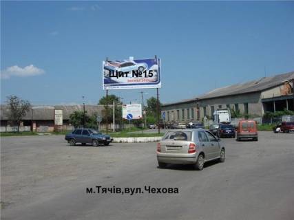 Білборд, Бігборд (Борд)  A у Тячеві м. Тячів вул.Чехова - Комсомольська, трансортна розв'язка що з'єднує вокзали ЖД АВТО зі спальними районами. Фото 1
